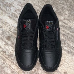 Men’s black REEBOK classics.